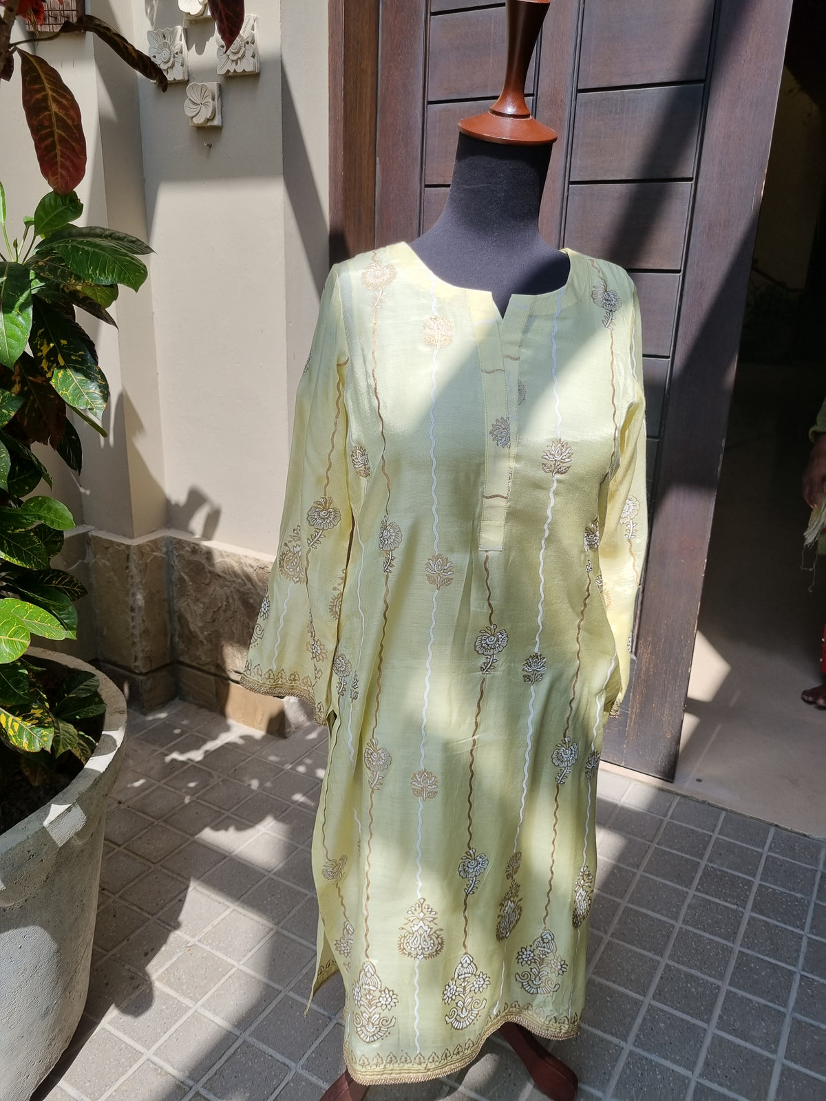 Silk Block Printed Shirt Paired with Khaadi Net Blocked Dupatta and Plain Khaadi Silk Pants. Unstitched