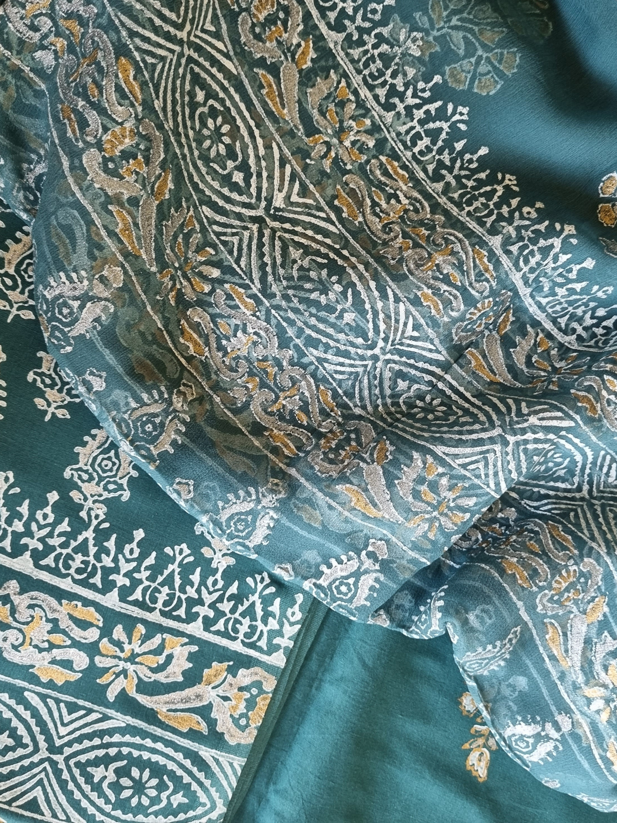 Block Printed Teal Green Cotton Silk Shirt with Block Printed Chiffon Dupatta with Plain Cotton Silk Base Colored Pants. Unstitched