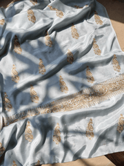 Silk Block Printed Shirt Paired with Khaadi Net Blocked Dupatta and Plain Khaadi Silk Pants. Unstitched