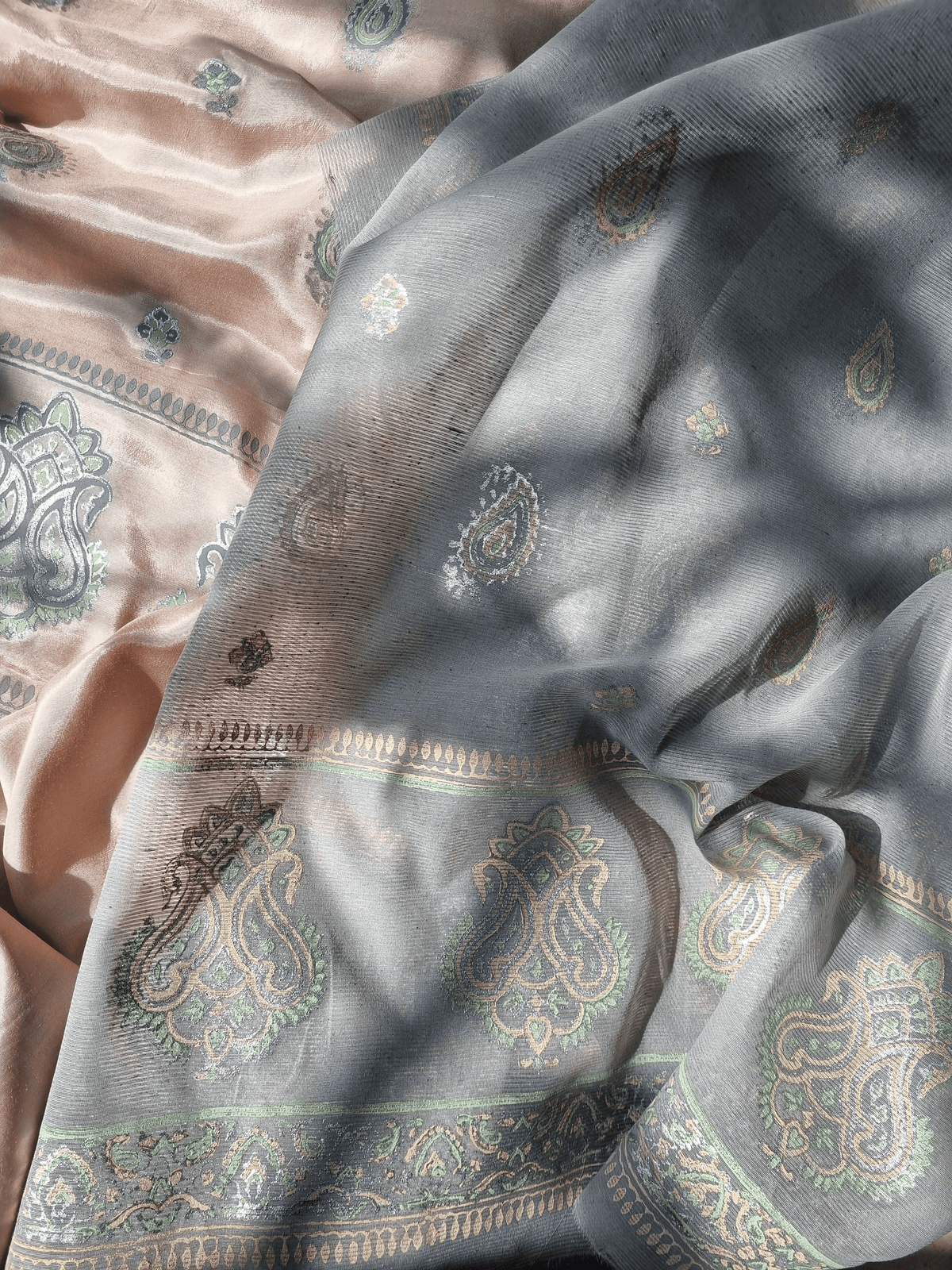 Silk Block Printed Shirt Paired with Khaadi Net Blocked Dupatta and Plain Khaadi Silk Pants. Unstitched